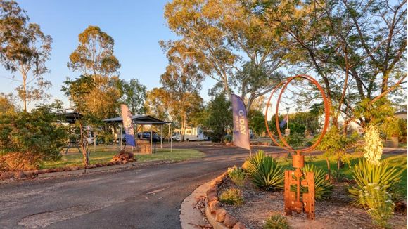 Exterior view of Cunnamulla Tourist Park reception at sunset